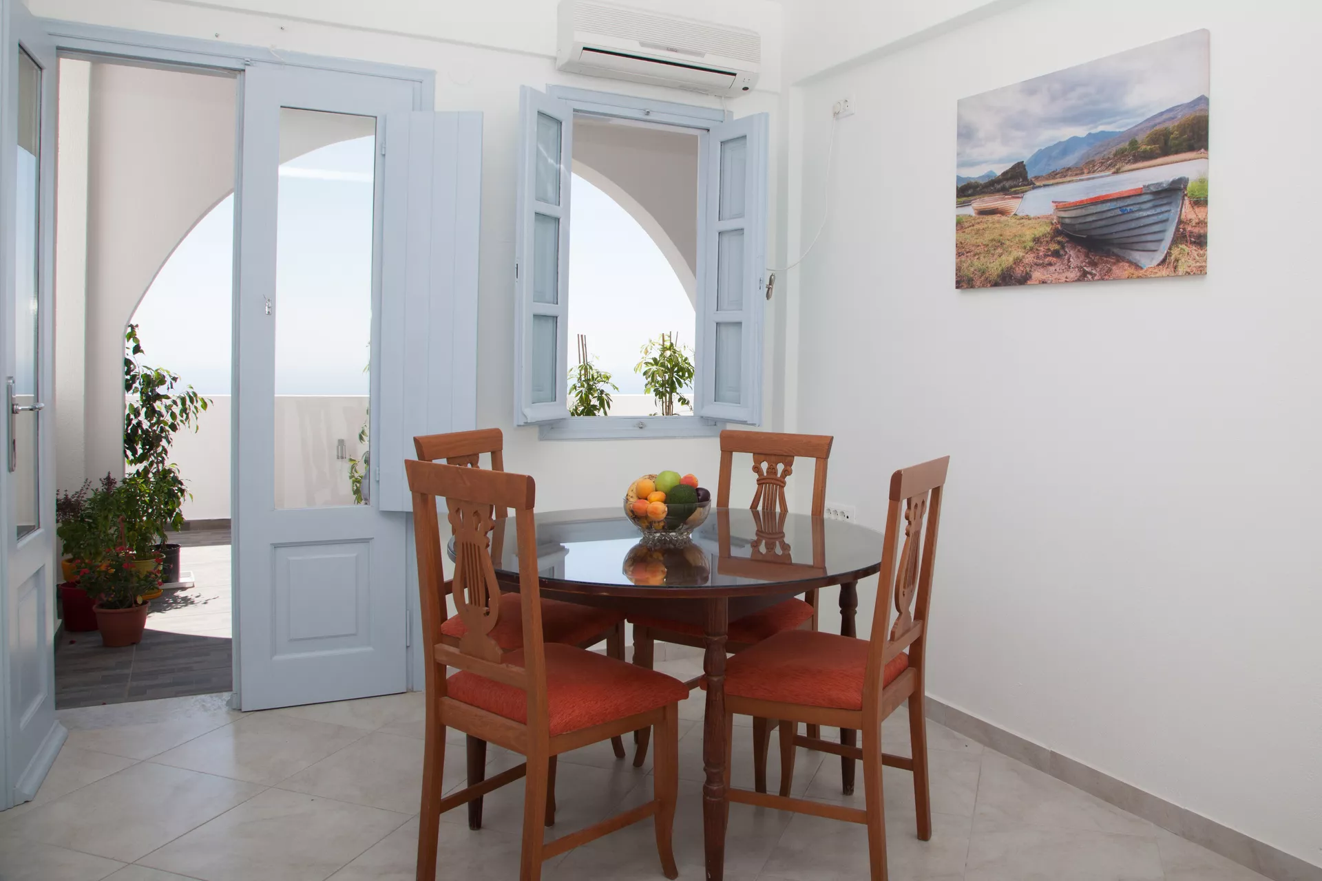 One-bedroom apartment living room with terrace access