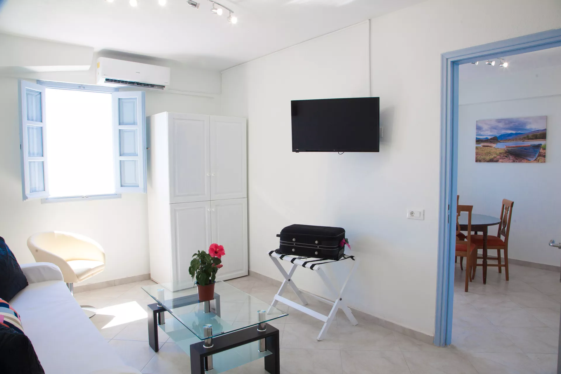 One-bedroom apartment living room with terrace access