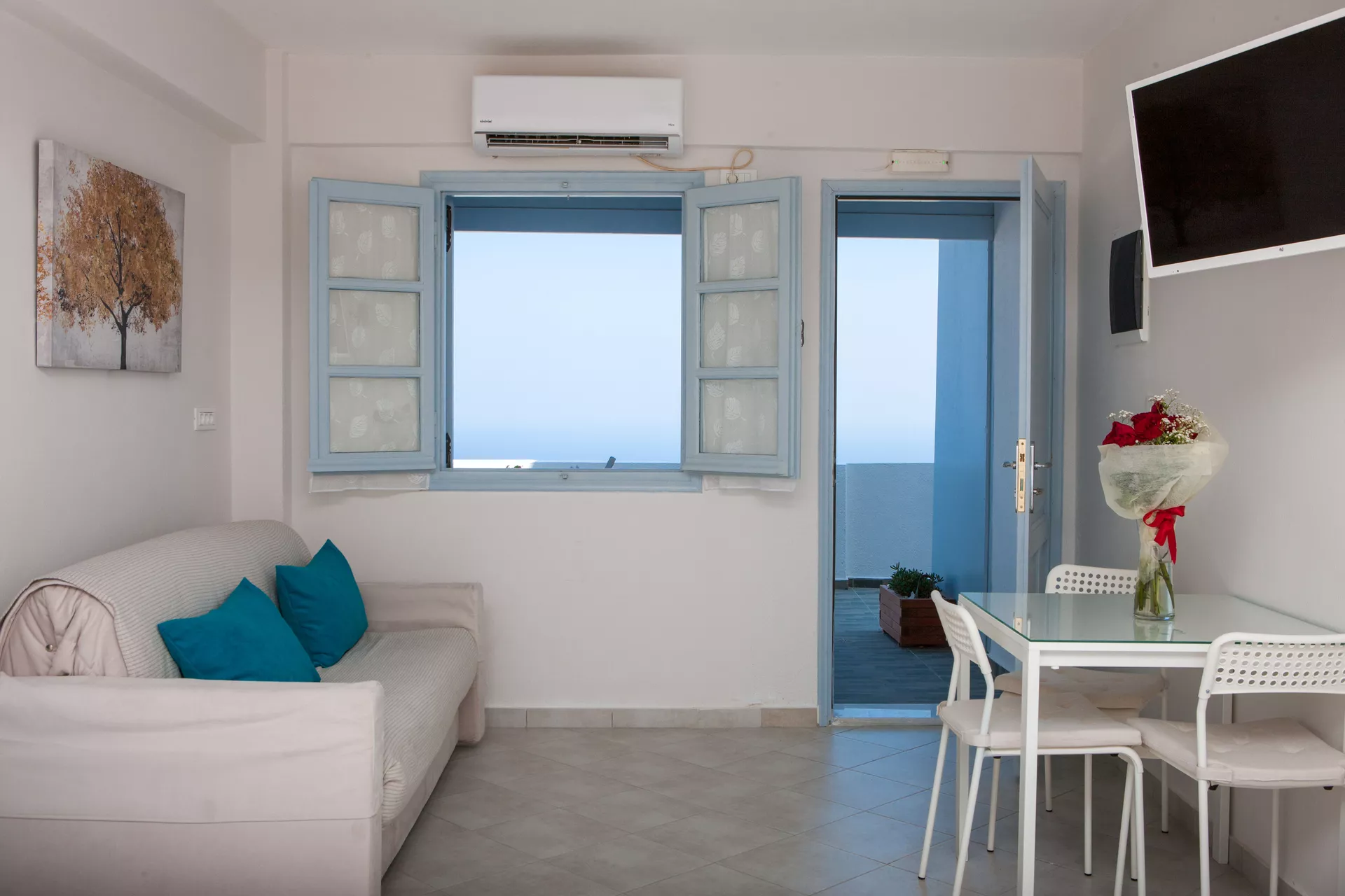 Bedroom opening to balcony views